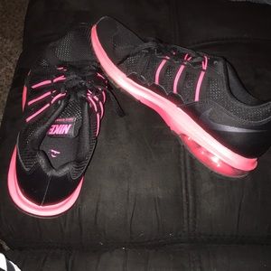 Black and pink nike shoes